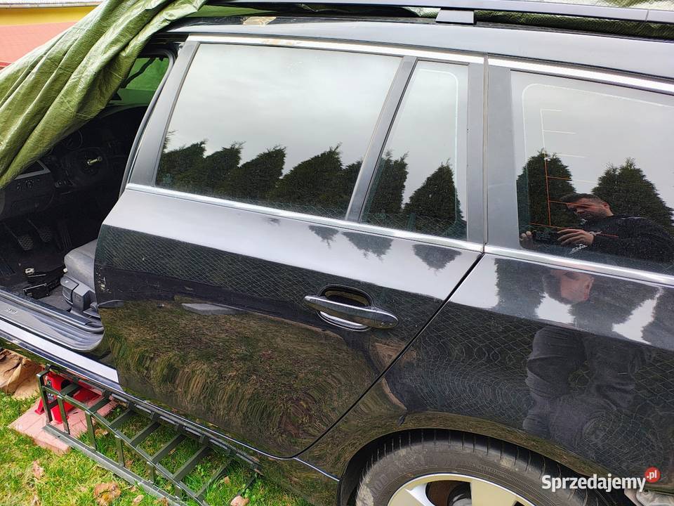 Drzwi lewy tył BMW E61 Black Saphir Metalic osobowe Świnna