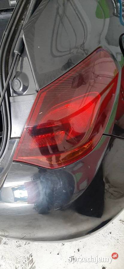 LAMPA REFLEKTOR PRAWY LEWY TYL ASTRA J K HB