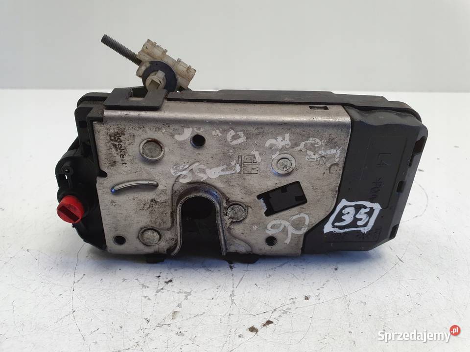 Opel Corsa D ZAMEK DRZWI lewy przód Kierowcy Rudka