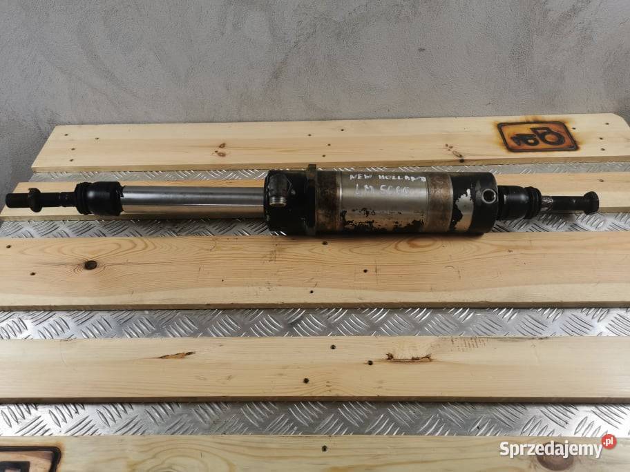 Holland LM 5060 Cylinder hydrauliczny skrętu