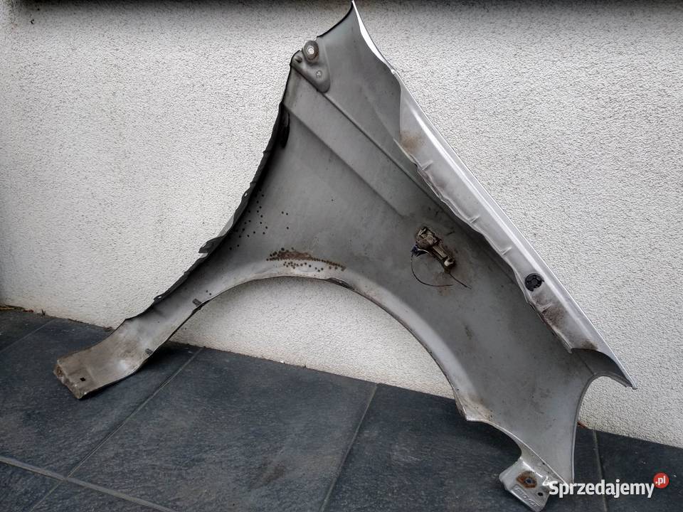 Toyota Yaris I LIFT FL błotnik lewy kierowcy osobowe Sieradz