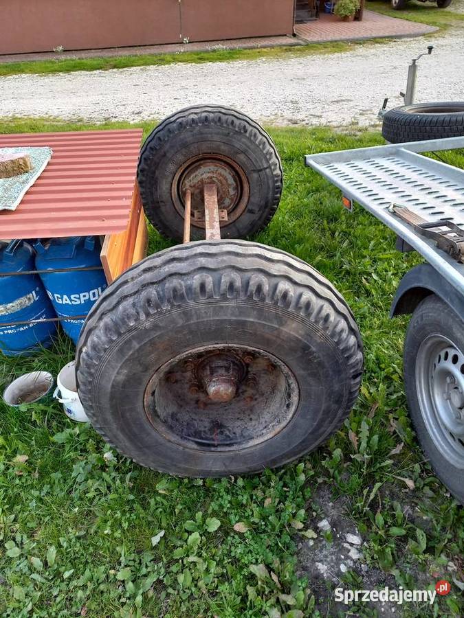 Sprzedam oś z hamulcami kołami balonowymi stan b