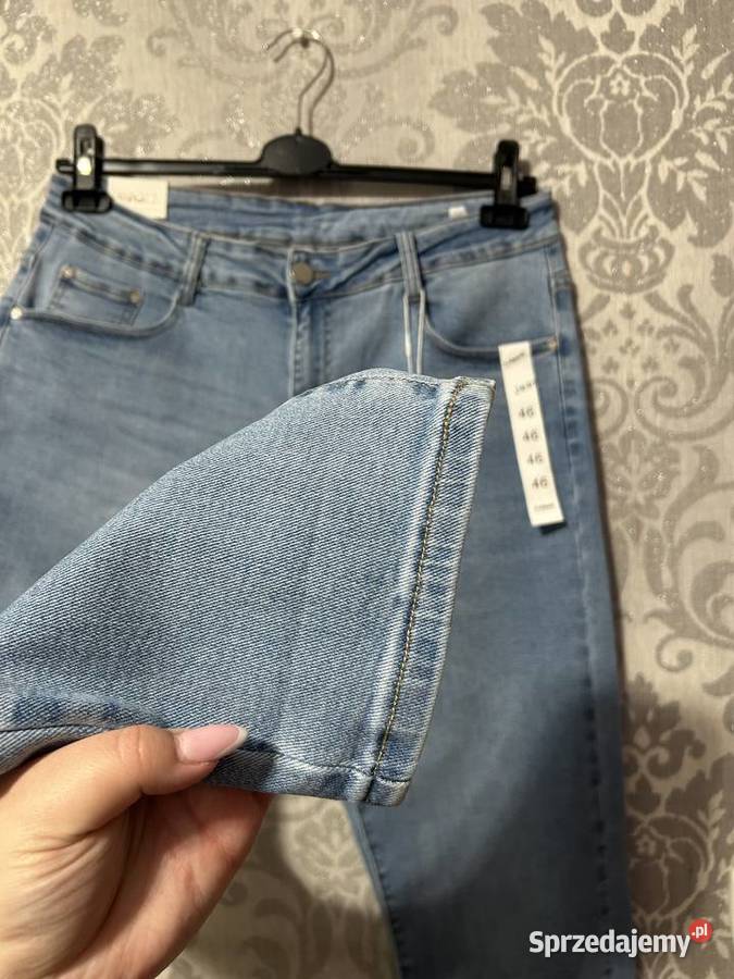 Jasnoniebieskie dżinsy Mom Fit 46 mazowieckie