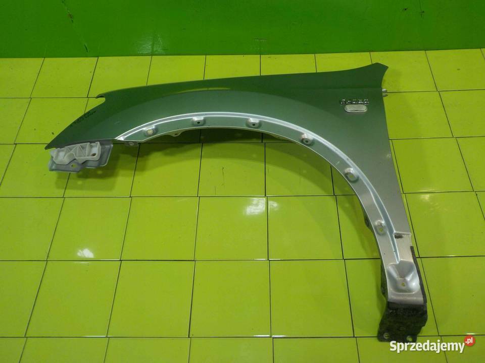 NISSAN QASHQAI J10 I 2 09r blotnik lewy przod Suków