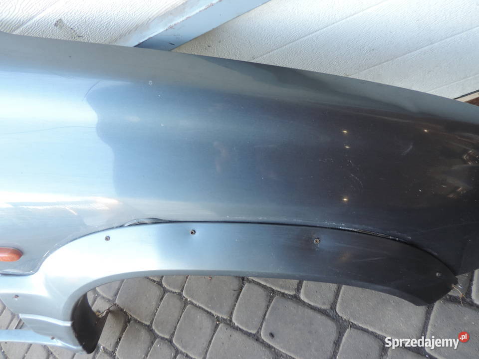 SUZUKI GRAND VITARA I BŁOTNIK PRAWY PRZÓD ZY4C13 Nowy Sącz