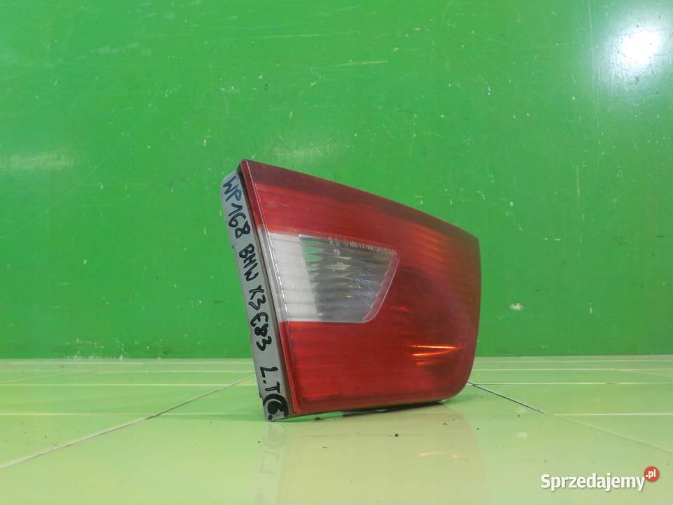 BMW X3 E83 25 B AUT 06r lampa lewa tyl w klape