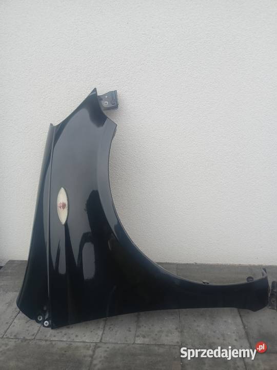 Błotnik prawy lewy Toyota Yaris P1 9905 kod Błotniki Warszawa