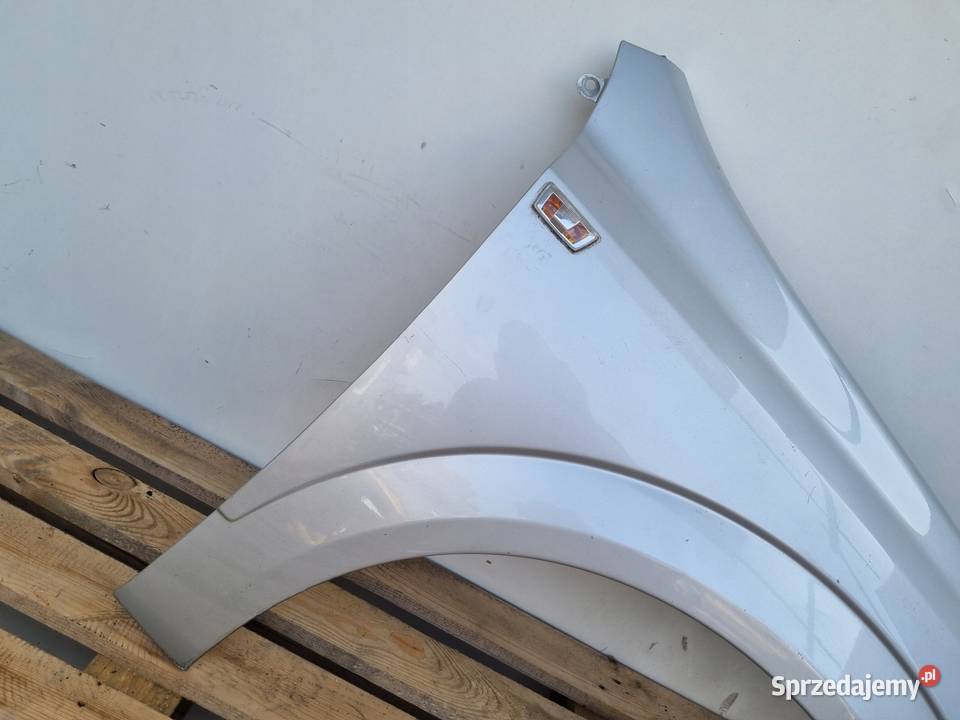 Opel Astra III H HTB sedan kombi 0409r PRZEDNI Rudka