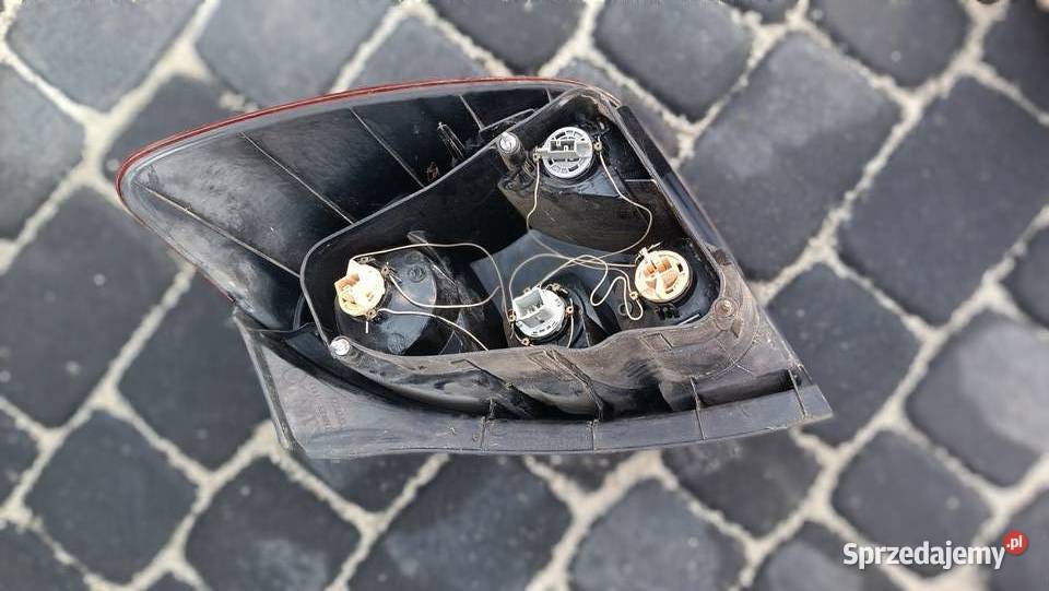 Lampa lewy tył Toyota Corolla Verso I EU 0104r Radłów