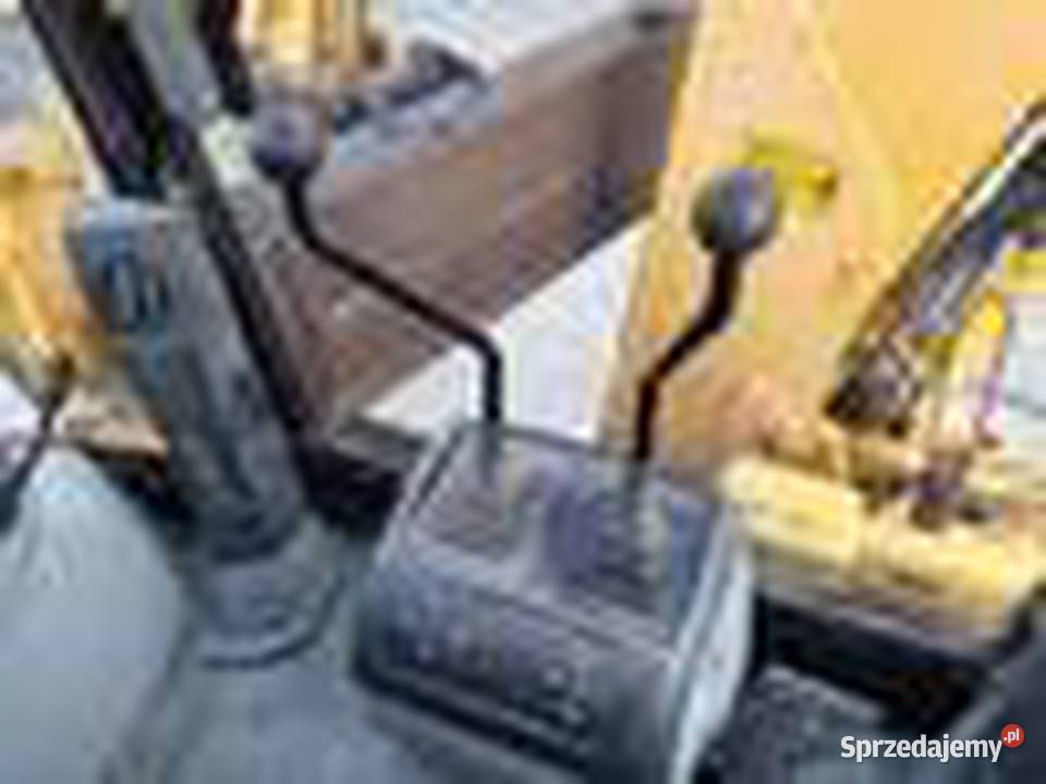 Caterpillar 428F Koparko ładowarki Słowik