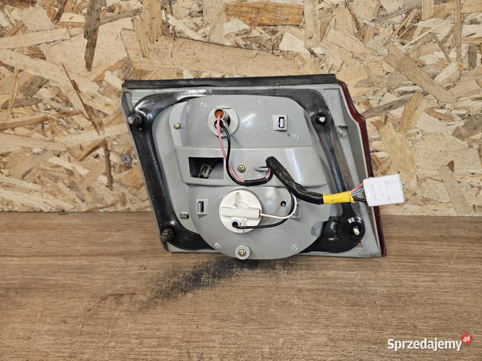 KIA CARENS II 0206 LAMPA LEWA PRAWA TYŁ TYLNA W Międzychód