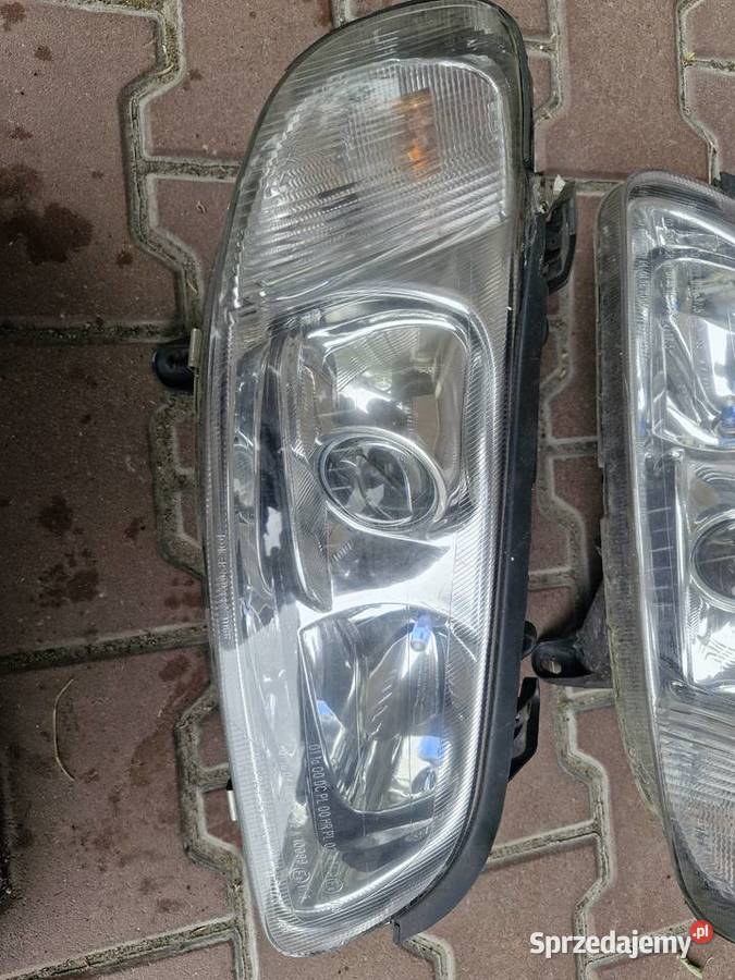 Lampy przednie Opel Omega B FL soczewki Wieluń