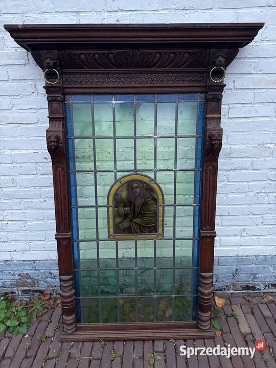 Stary kościelny witraż oprawiony w drewno z Długopole-Zdrój