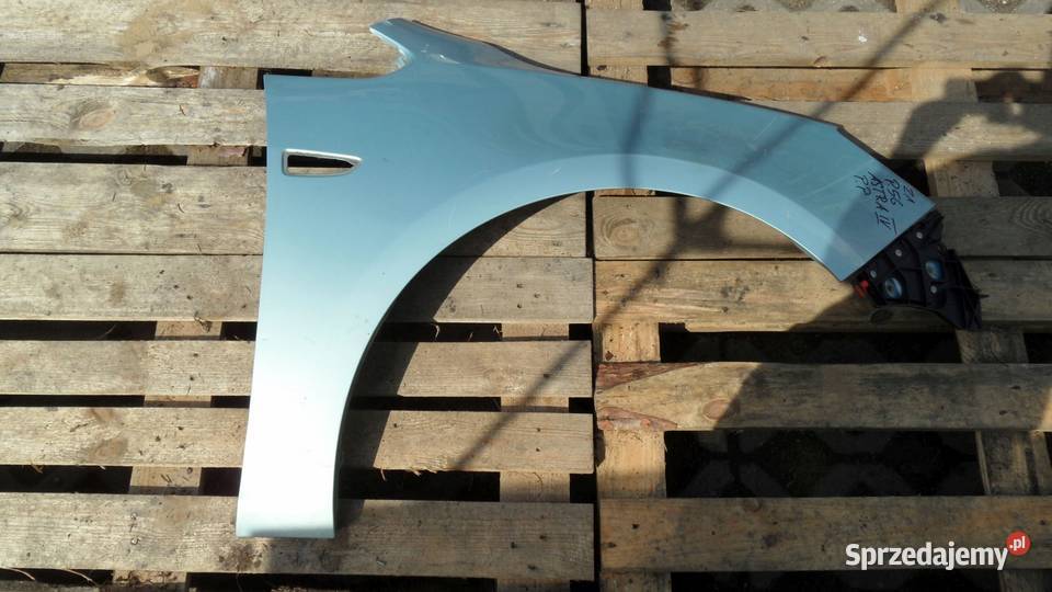 OPEL ASTRA J IV 10r błotnik prawy przód 210