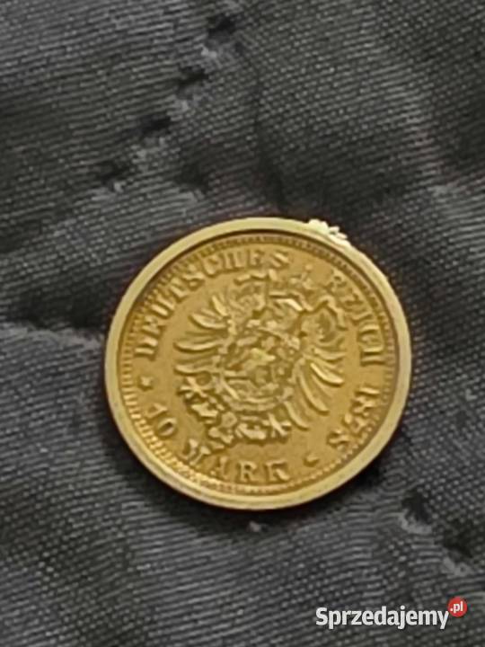 Trzy złote monety próby 999 i 585 Głogów