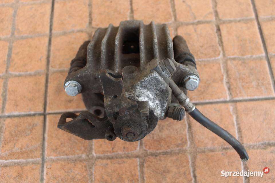 ZACISK HAMULCOWY LEWY TYŁ VW BEETLE 20B