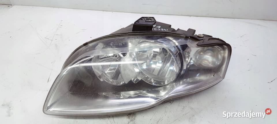 REFLEKTOR LEWY AUDI A4 B7 8E0941003BL UK Przystajń sprzedam