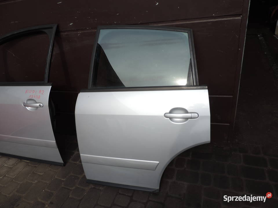 AUDI A2 DRZWI LEWY TYŁ osobowe Drzwi Części samochodowe Nowy Sącz