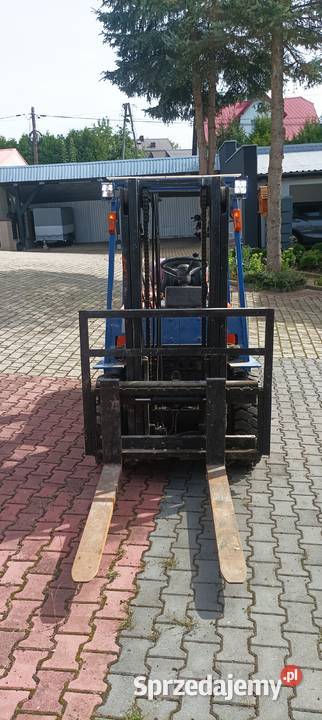 wózek widłowy blokada podnośnika
