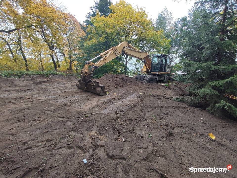 Koparka kołowa JCB js 130 w cat case komatsu