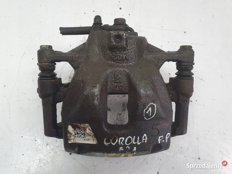 Toyota Corolla XII E21 PRAWY PRZEDNI ZACISK Chełm