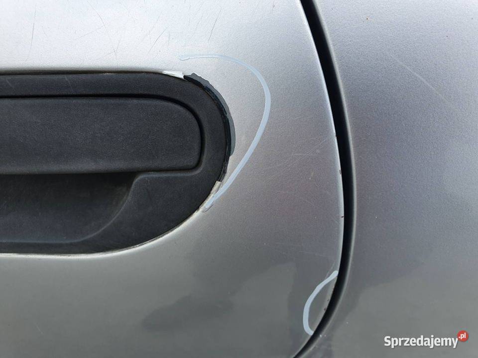 DRZWI LEWE TYŁ VOLVO V40 32973 Pozostałe Lipno