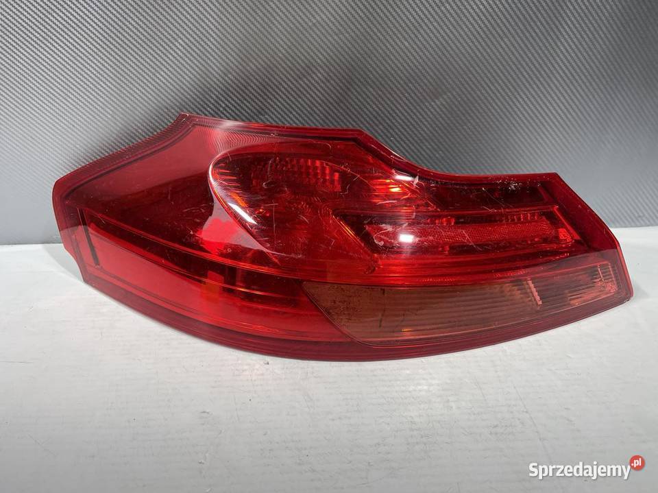 OPEL INSIGNIA LEWA LAMPA TYŁ KOMBI Lewe Oświetlenie Ostroróg