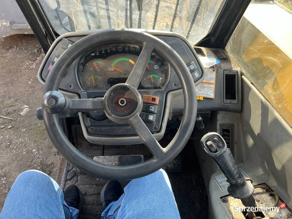 CAT TH 330 2007r Felga Wilkowo