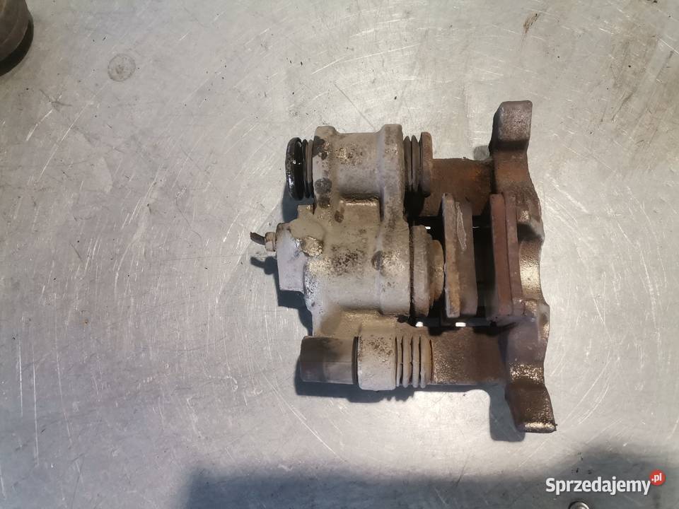 ZACISK HAMULCOWY PRAWY TYŁ TYLNY PEUGEOT 406 osobowe Nowy Sącz