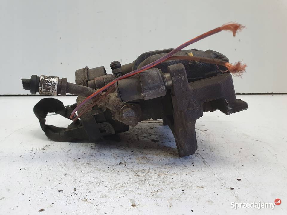 Volvo V60 II TYLNY ZACISK HAMULCOWY lewy tył Chełm