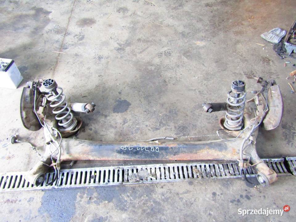 BELKA OŚ ZAWIESZENIA TYŁ TYLNA 12 DIGT NISSAN