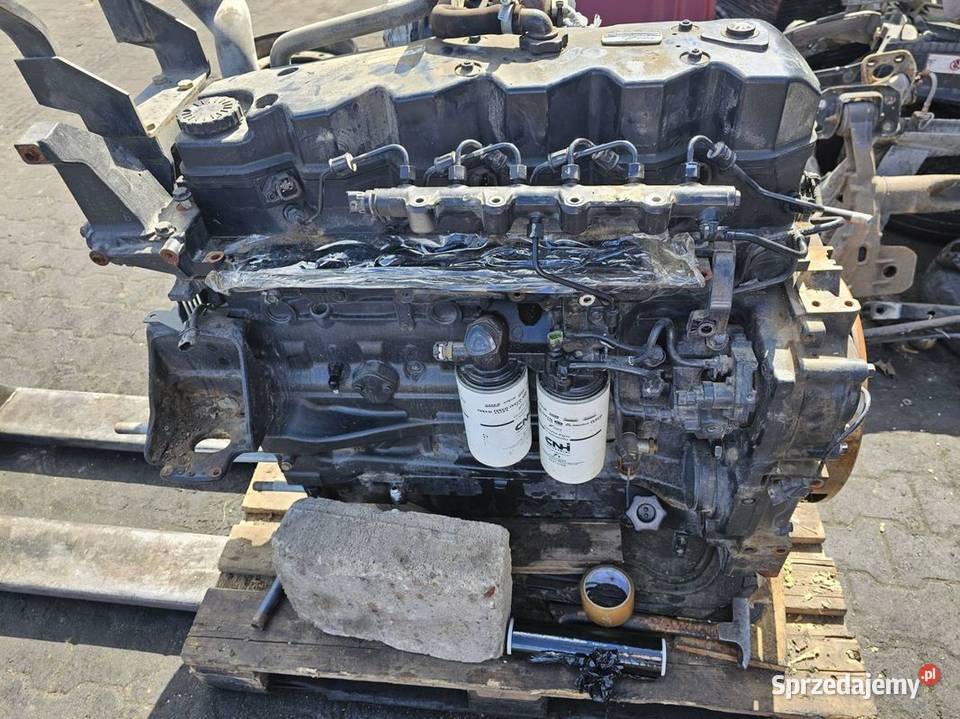 SILNIK SŁUPEK HOLLAND T6175 175 1280376