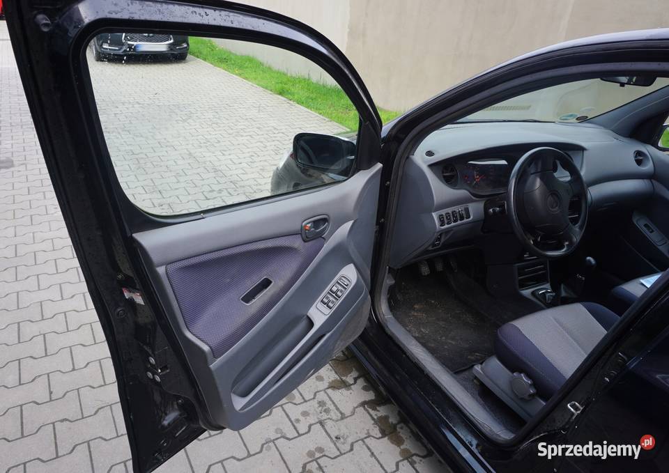 PRZYCISK PANEL SZYB LEWY PRZÓD DAIHATSU YRV M200 Nowy Tomyśl