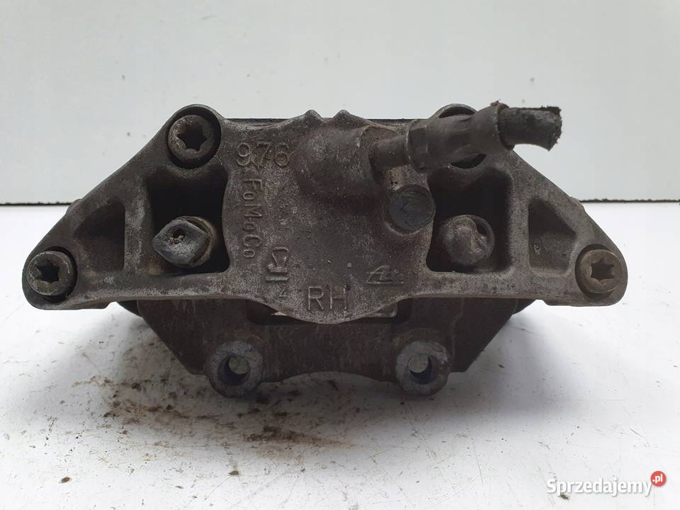 Volvo V40 II PRZEDNI ZACISK HAMULCOWY lewy przód lubelskie Janów