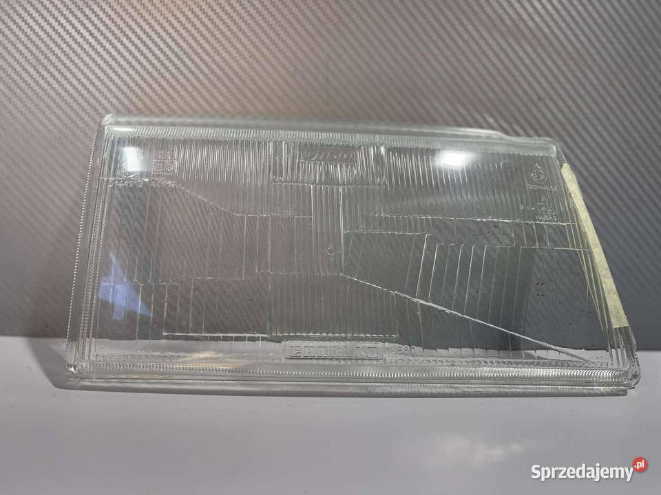 FIAT UNO PRAWY KLOSZ ORYGINAŁ CARELLO 1989 Lampy przednie Ostroróg