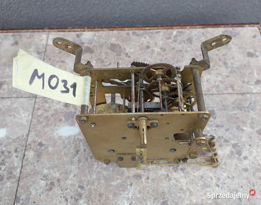 M031 Mechanizm starego zegara kominkowego bufetowego