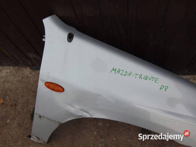 BŁOTNIK PRAWY PRZÓD MAZDA TRIBUTE
