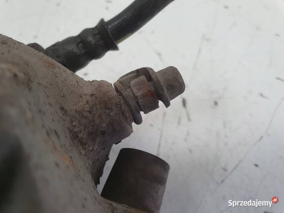 BMW E39 PRZEDNI ZACISK HAMULCOWY lewy przód Rudka