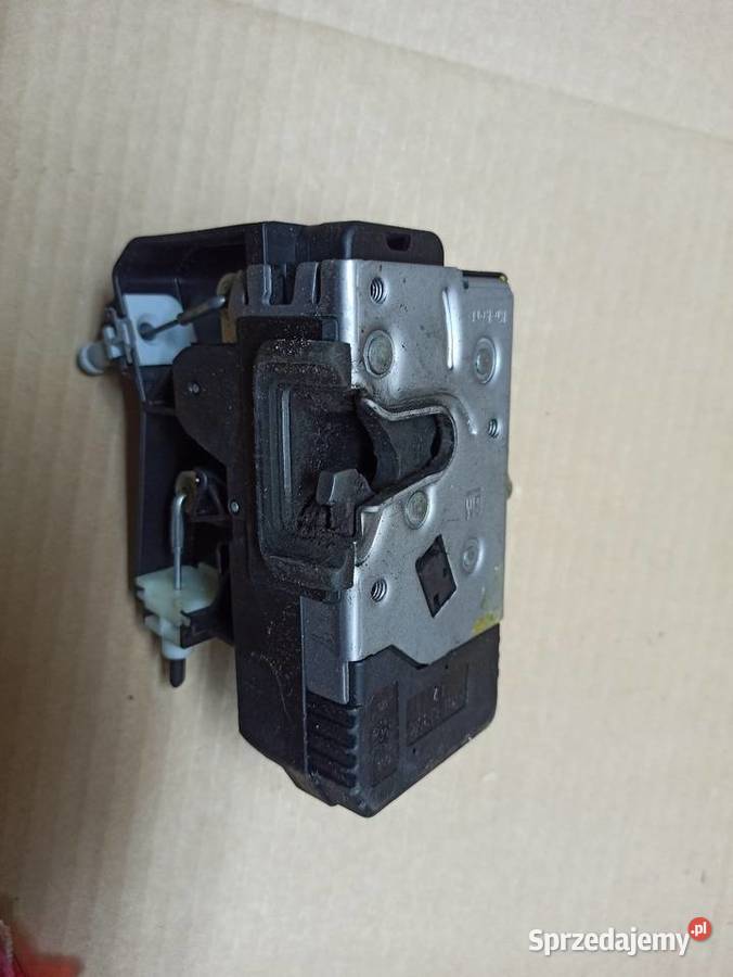 ZAMEK DRZWI LEWY PRZÓD OPEL CORSA C 24434884EQ Motoryzacja