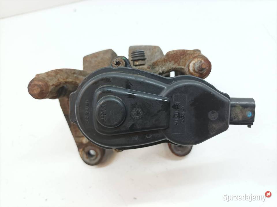 ZACISK HAMULCOWY LEWY TYŁ 32 B KL Jeep Cherokee Zaciski i jarzma