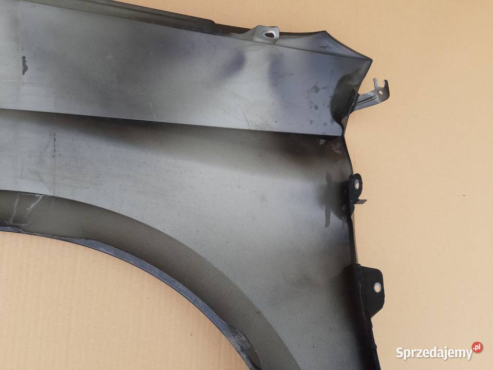 SEAT LEON IV BŁOTNIK PRAWY PRZÓD 5FA821116A osobowe Części samochodowe Trzciel