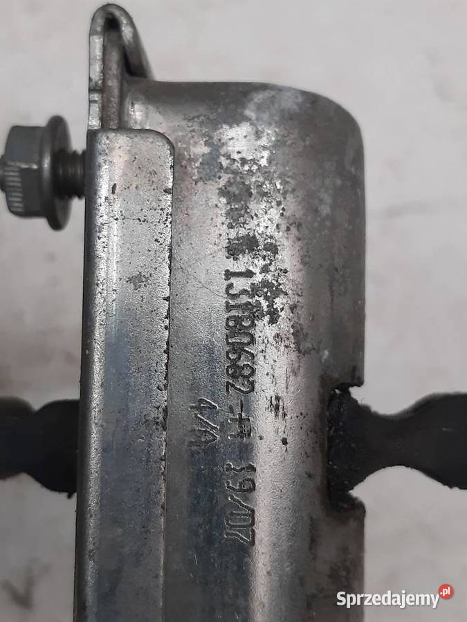 Opel Corsa D 5 D Lewy Przedni ogranicznik drzwi Ksawerów