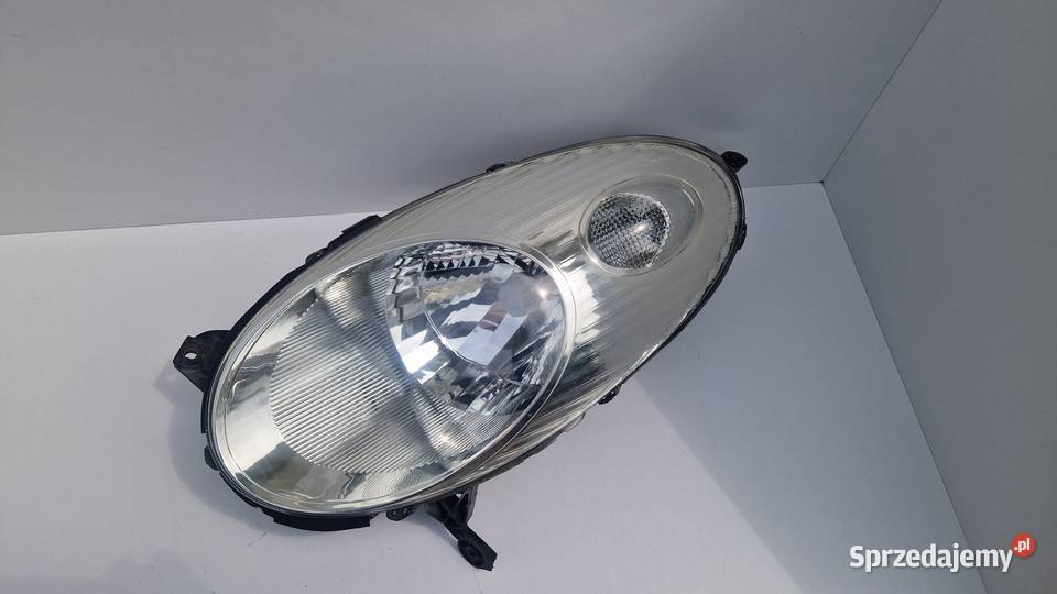NISSAN MICRA K12 LAMPA PRZÓD PRZEDNIA LEWA Słowikowo