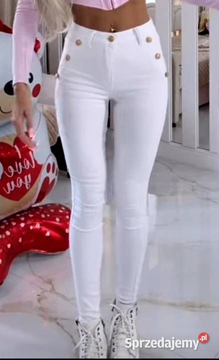 Białe spodnie jeansowe rurki złote guziki napy Kłodzko