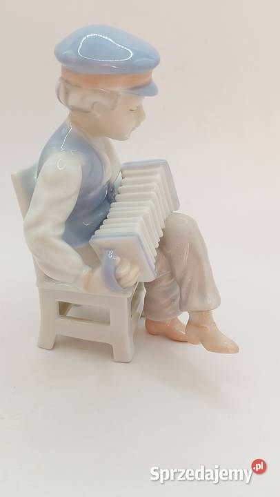 Figurka porcelana chłopiec z akordeonem Zamość