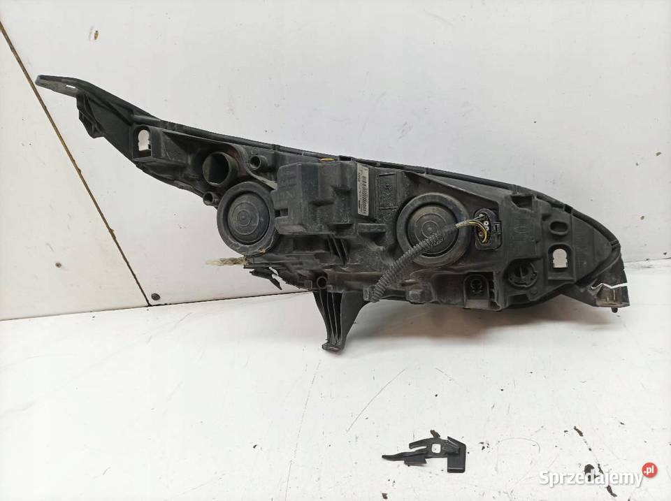 LAMPA PRZÓD LEWA EU USZKODZONA 9007036 Ford