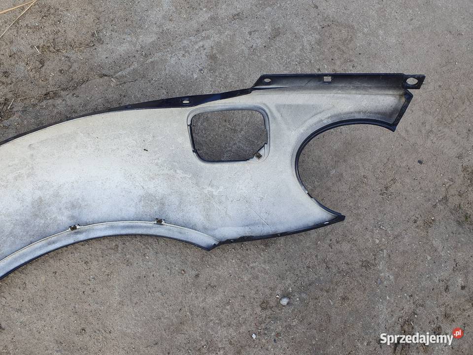 VW BEETLE 1C0 BŁOTNIK PRAWY TYŁ TYLNY 1C0821302E Międzychód