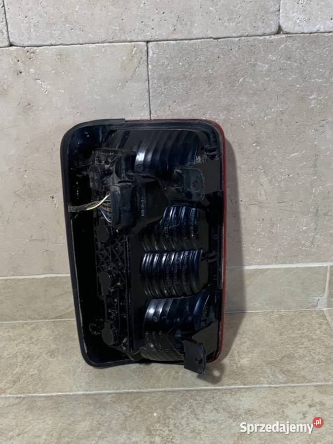 Lampa lewa tylna VW CADDY III LIFT 20102015 osobowe małopolskie