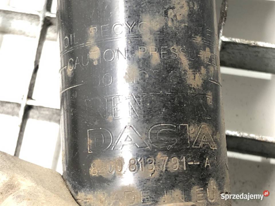 AMORTYZATOR LEWY PRZÓD ZE SPRĘŻYNĄ DACIA DUSTER