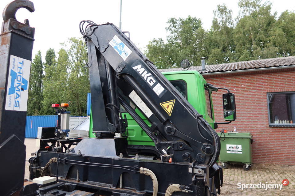 Hakowiec z dzwigiem Nissan 9000kg Warszawa